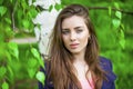 Russian beauty - Young brunette girl at a white birch Royalty Free Stock Photo