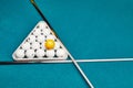 Russian billiard balls, cue, triangle, on a table. blue cloth with space for text