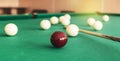 Russian billiard table with balls and cue sticks Royalty Free Stock Photo