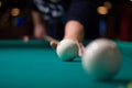Russian billiards player aims to shoot ball with cue Royalty Free Stock Photo
