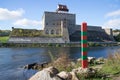 A russian border post on the background of the Narva river and the Herman castle Royalty Free Stock Photo