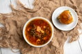 Russian borscht with sorrel and fresh garlic knots pamopushkas. Royalty Free Stock Photo