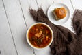 Russian borscht with sorrel and fresh garlic knots pamopushkas. Royalty Free Stock Photo