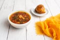 Russian borscht with sorrel and fresh garlic knots pamopushkas. Royalty Free Stock Photo