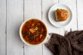 Russian borscht with sorrel and fresh garlic knots pamopushkas. Royalty Free Stock Photo