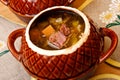 Russian cabbage soup in ceramics pot