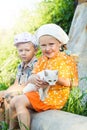 Russian children with kitten Royalty Free Stock Photo