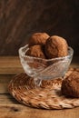 Russian chocolate cake potato, in a crystal vase, on a textured beautiful background. Royalty Free Stock Photo