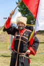 Russian Cossack with the Russian flag