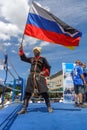 Russian Cossack with the Russian flag