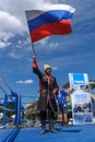 Russian Cossack with the Russian flag