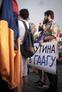 Russian demonstrator in Armenia with a banner against Putin