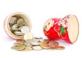 Russian doll with coins Royalty Free Stock Photo