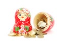 Russian doll with coins Royalty Free Stock Photo