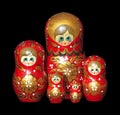 Russian dolls isolated on black