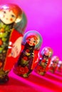 RUSSIAN DOLLS ON PURPLE BACKGROUND Royalty Free Stock Photo