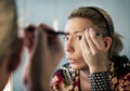 Russian drag queen putting on makeup Royalty Free Stock Photo