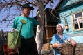 Russian elderly farmers in the country house.