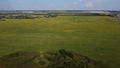 Russian field in summer with bluesky and sunflowers from the distanse of drone photo and birds vision Royalty Free Stock Photo