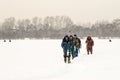 Russian Fishermen Ice Fishing in Winter Royalty Free Stock Photo