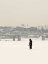 Russian Fishermen Ice Fishing in Winter Royalty Free Stock Photo