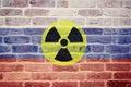 Russian flag on wall and radioactive symbol