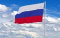 Russian flag waving in the wind over blue sky Royalty Free Stock Photo