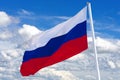 Russian flag waving in the wind over blue sky Royalty Free Stock Photo