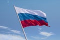 Russian flag waving in the wind over blue sky Royalty Free Stock Photo