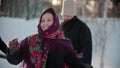 Russian folklore - russian people dancing outdoors at winter