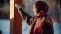 Russian folklore - Russian woman smiling standing outdoors