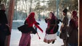 Russian folklore - Russian woman swinging and everyone is laughing on a sunny day