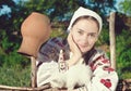 Russian girl with white kitten Royalty Free Stock Photo