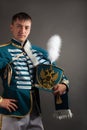 Russian hussar on gray background Royalty Free Stock Photo
