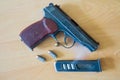 Russian 9mm handgun PM Makarov on the table with holster, belt and empty pistol holder Royalty Free Stock Photo
