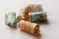 Russian money, banknotes of five thousand, one thousand and five hundred rubles rolled into a tube Royalty Free Stock Photo