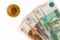 Russian money and bitcoin on white background Royalty Free Stock Photo