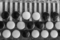 Black and white buttons on button accordion close-up Royalty Free Stock Photo