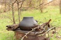 Russian national cast iron pot for the stove washed dried in the garden.