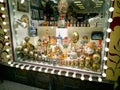 Russian national nesting doll and other souvenirs in the window of a gift shop