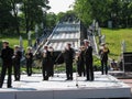 Russian naval orchestra performs for tourists at formal garden near fountain Cascade Chess Mountain
