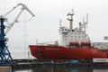 Russian nuclear-powered icebreaking lighter aboard ship carrier, container ship Sevmorput anchored in container terminal commercia