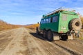 Russian off-road extreme expedition truck with passengers, Kamchatka, Russia.