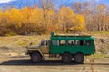 Russian off-road extreme expedition truck with passengers, Kamchatka, Russia.