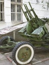 Russian old green anti-aircraft gun isolated over white