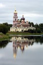Russian orthodox church on the bank of a river Royalty Free Stock Photo