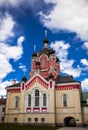 Russian Orthodox Church, a temple on a background of blue sky and clouds Royalty Free Stock Photo
