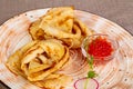 Russian pancakes with red caviar Royalty Free Stock Photo