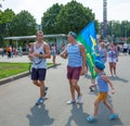 Russian paratroopers demobilized with a flag and a little boy Royalty Free Stock Photo