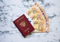 Russian passport with euro on marbel background